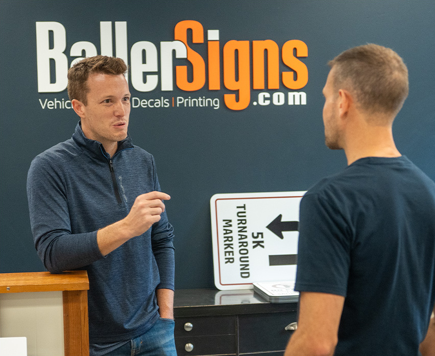 Blake Fiechter speaking to a voter